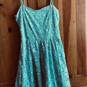 Lace-lined light summer dress; adjustable straps.